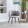 Grey velvet lounge chair; black metal feet; unique back design; suitable for office; living room; bedroom